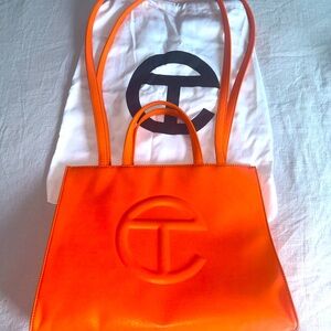 Telfar medium shopper. Vegan leather. Orange.
